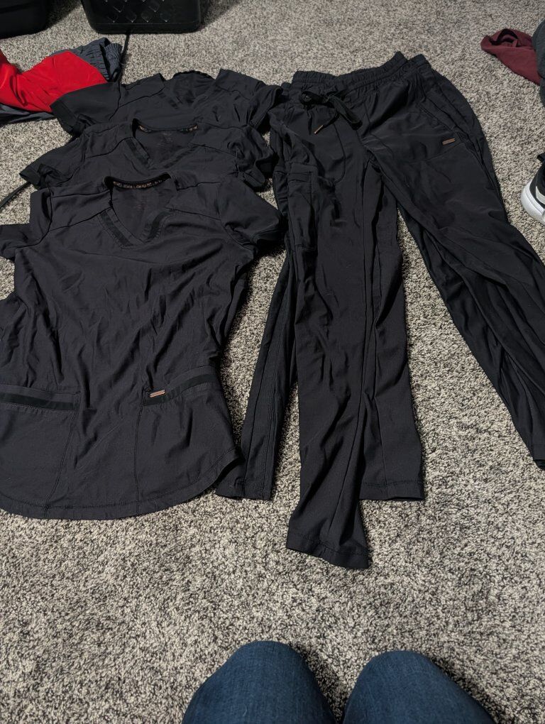 7 sets of xxs scrubs