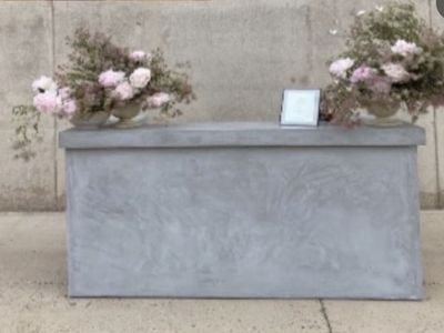 Custom portable concrete look plaster and wooden bar