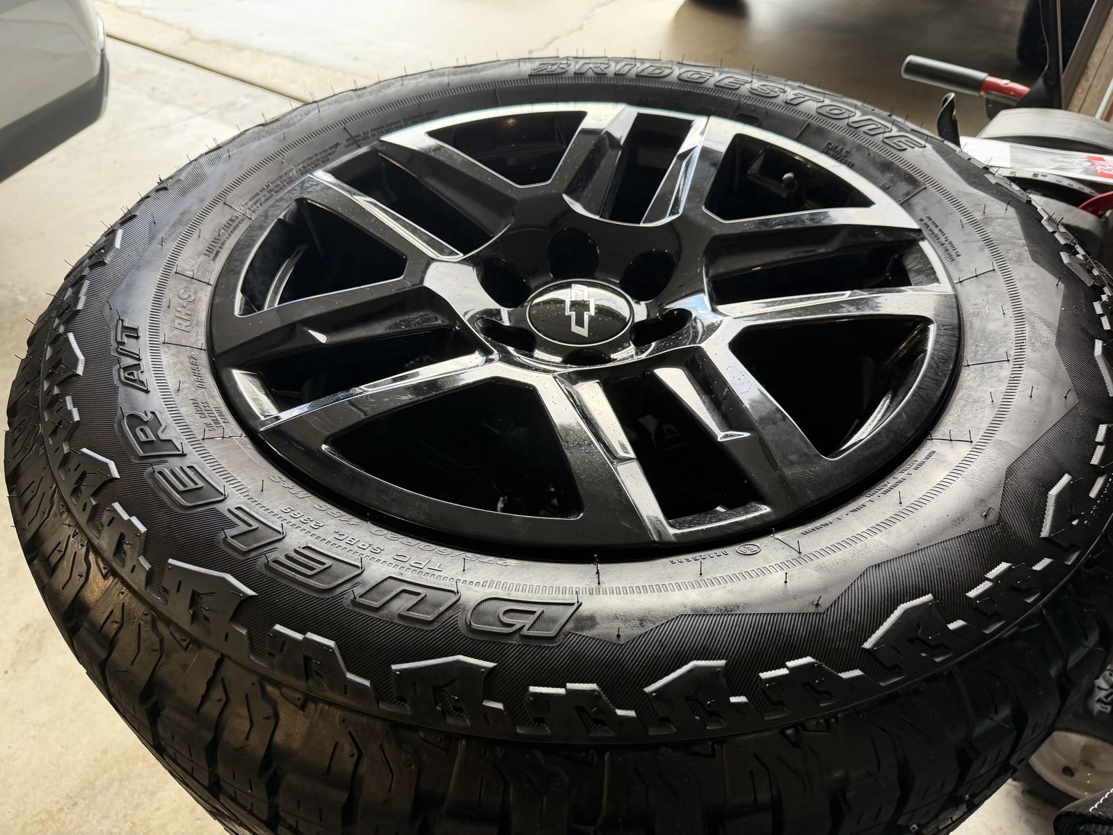 $2,000 OBO - 20” Chevy Wheels and New Bridgestone Tires.