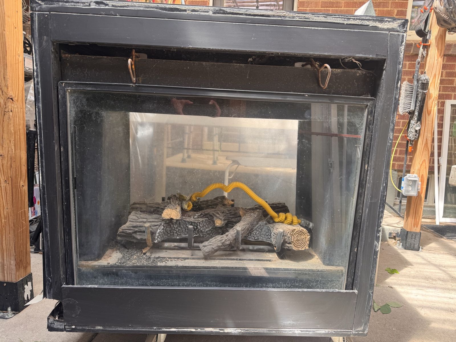 Used Gas Fireplace with Ceramic Logs and 2 sided Glass Door