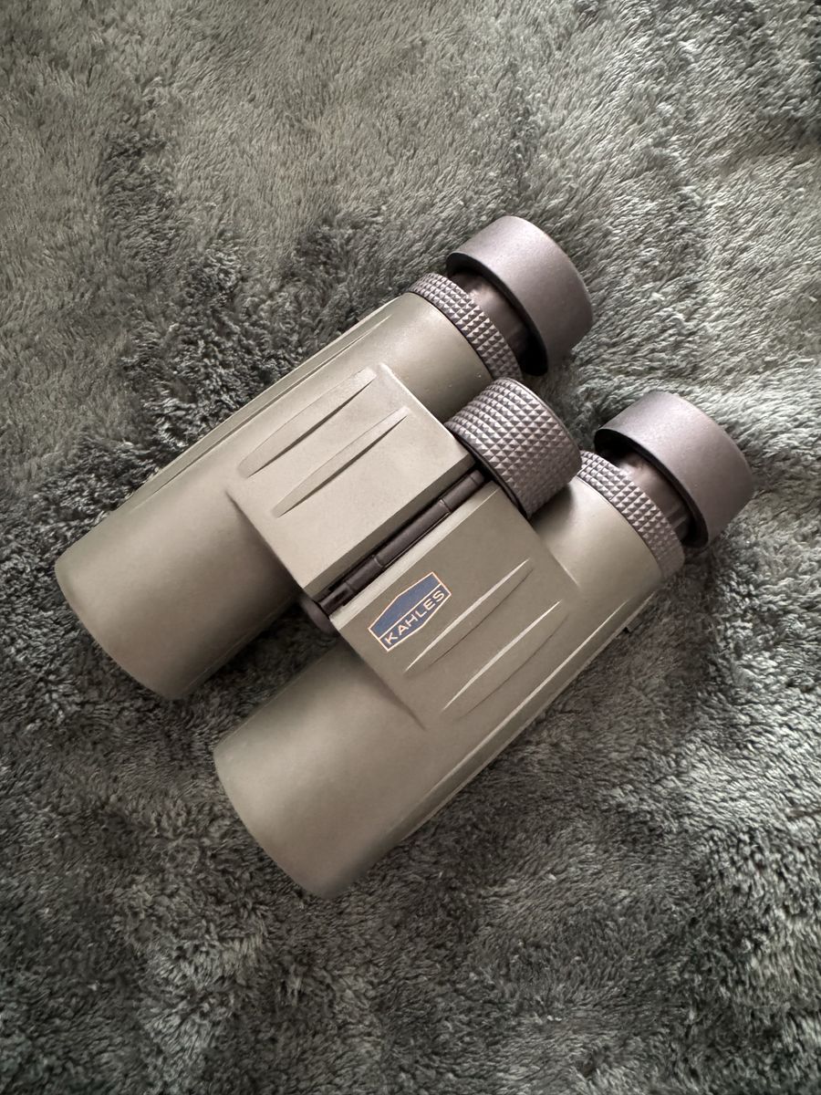 New never used Kahles 10x42 Binoculars with Camo Carrying Case