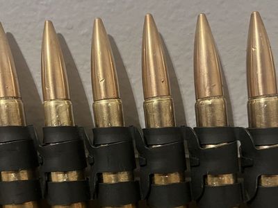 Linked 50 BMG dummy rounds display M2 ma deuce belt
