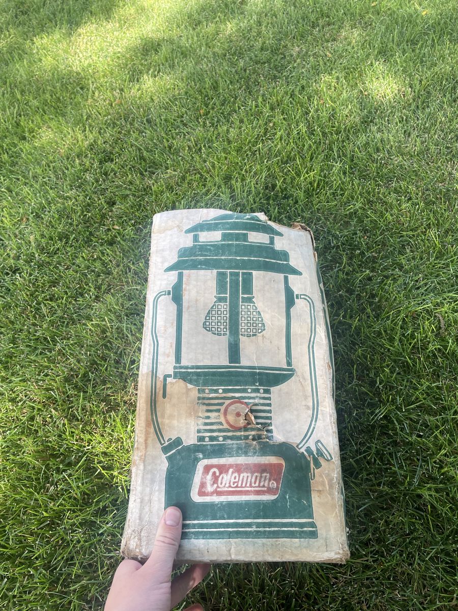 vintage Coleman Model 220F195 dual-mantle green gas lantern