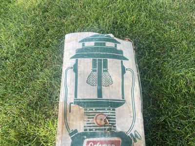 vintage Coleman Model 220F195 dual-mantle green gas lantern