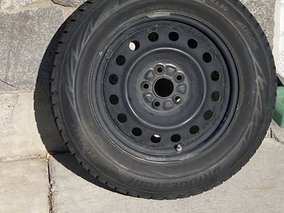 Bridgestone Blizzak WS80 Winter 195 65/R15 Tires on 15 inch Toyota Steel Rims