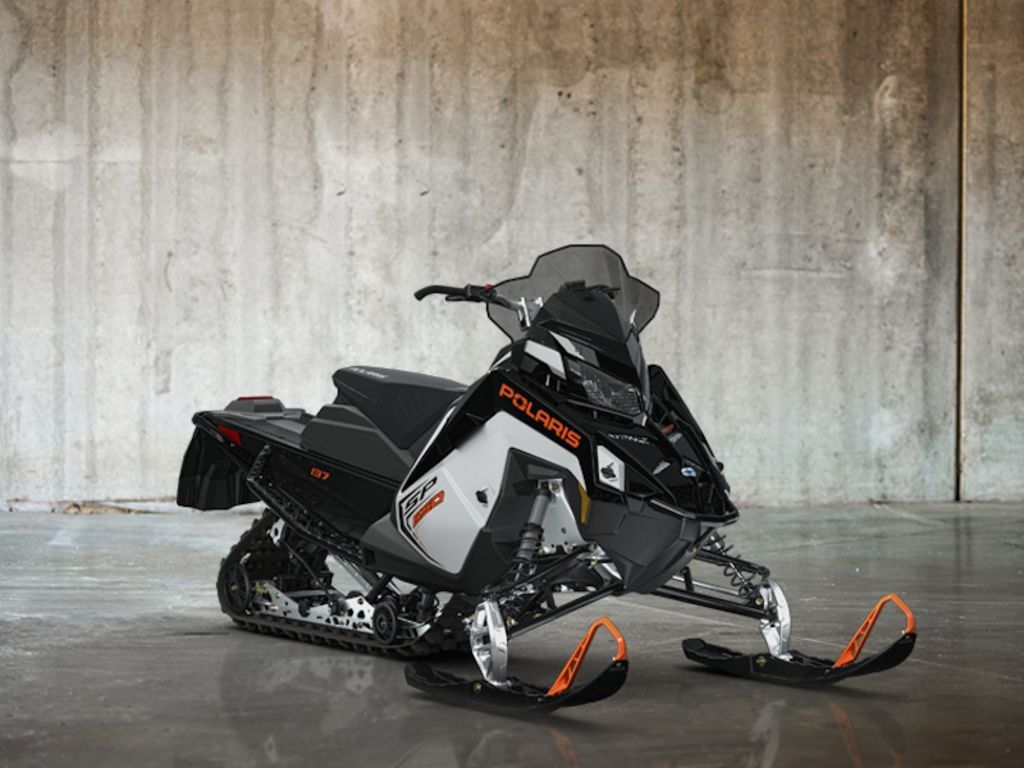 2027 Polaris® 650 INDY SP 137 White Lightning / Gloss Black / Orange Burst
