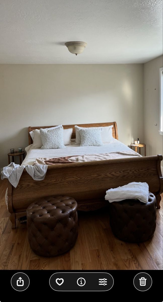 Large wooden sleigh bed