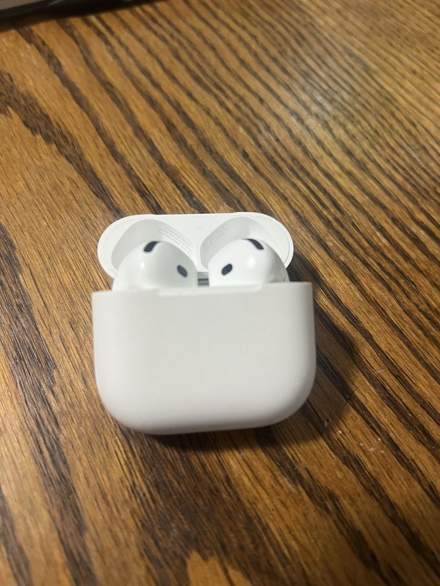 Apple AirPods Wireless Earbuds with Charging Case. ANC