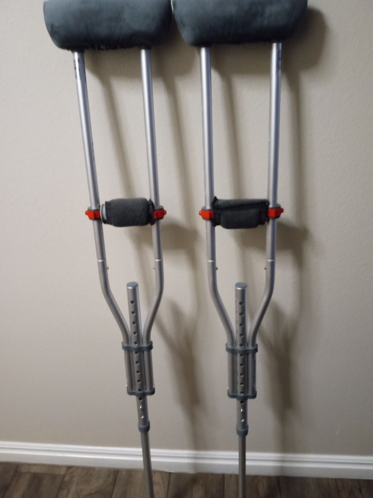Lightweight aluminum crutches adjustable purchased just a few months ago with added hand and shoulder pads 5'2-6'7