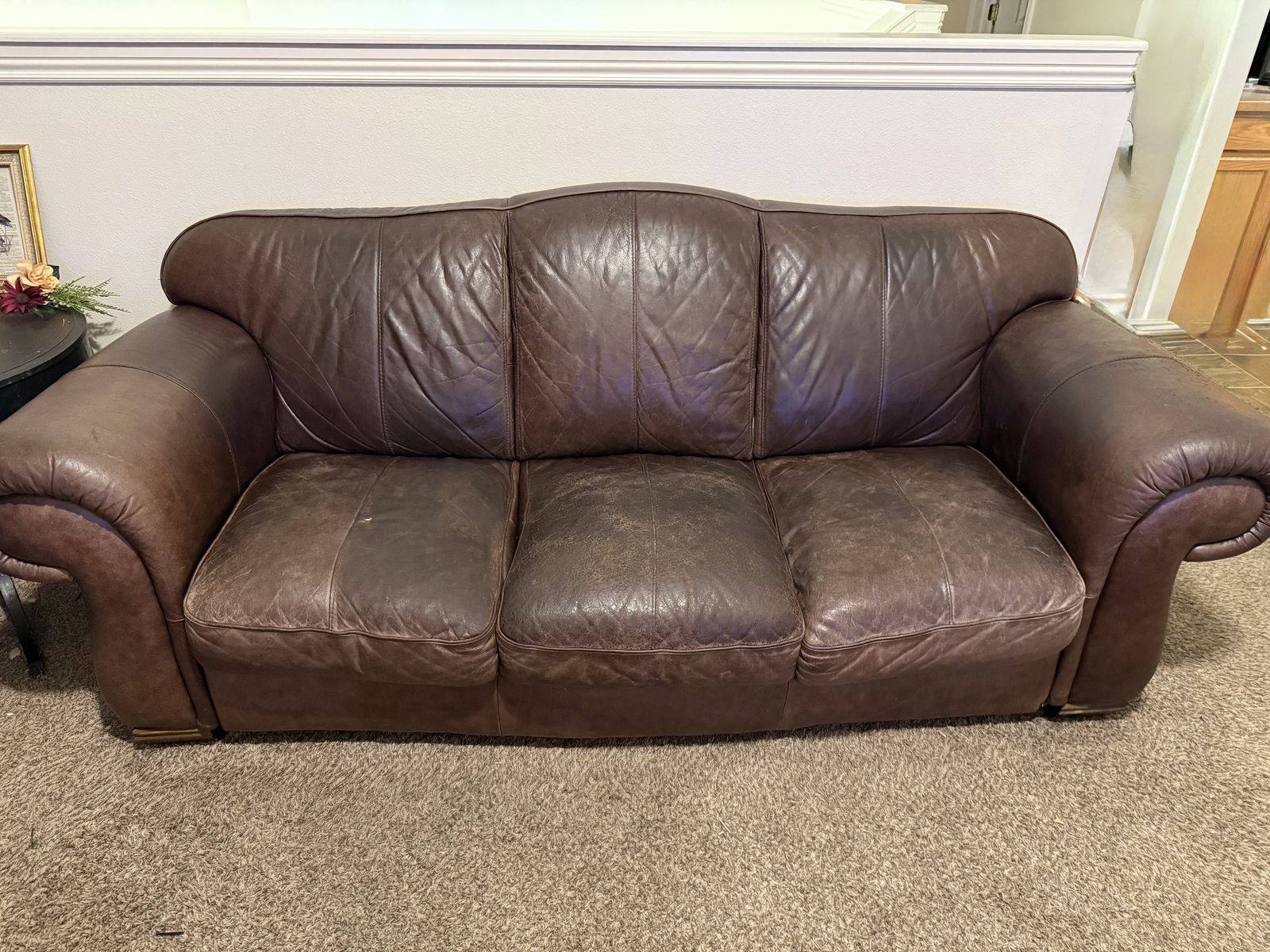 Leather couch, chair and ottoman