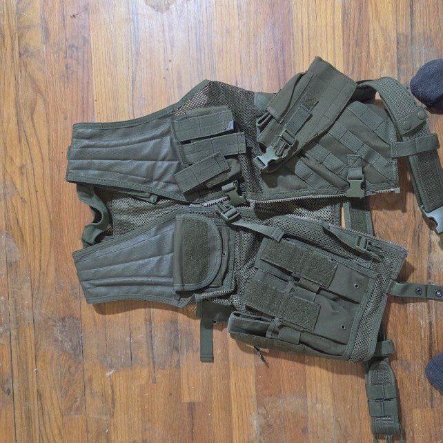 dark green airsoft vest, large