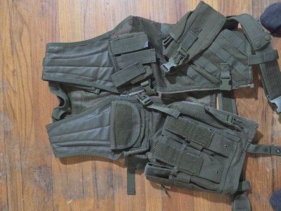 dark green airsoft vest, large