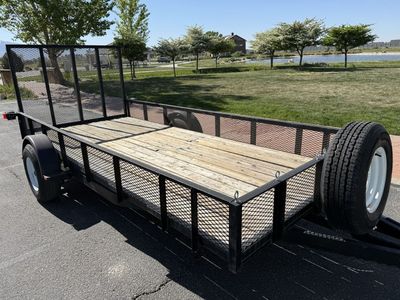 14 x 6 trailer with ramp and expanded metal enclosed sides, and motorcycle slots