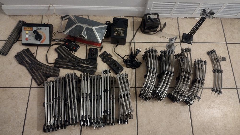 Vintage Post War Marx train sets w/2  transformers. Lots of O27 gauge track including  everything in the pictures  
