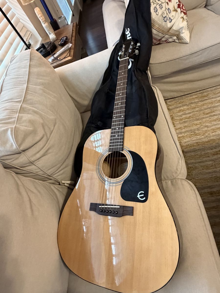 Acoustic Epiphone Guitar DR-100NA with case.