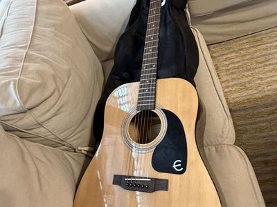 Acoustic Epiphone Guitar DR-100NA with case.