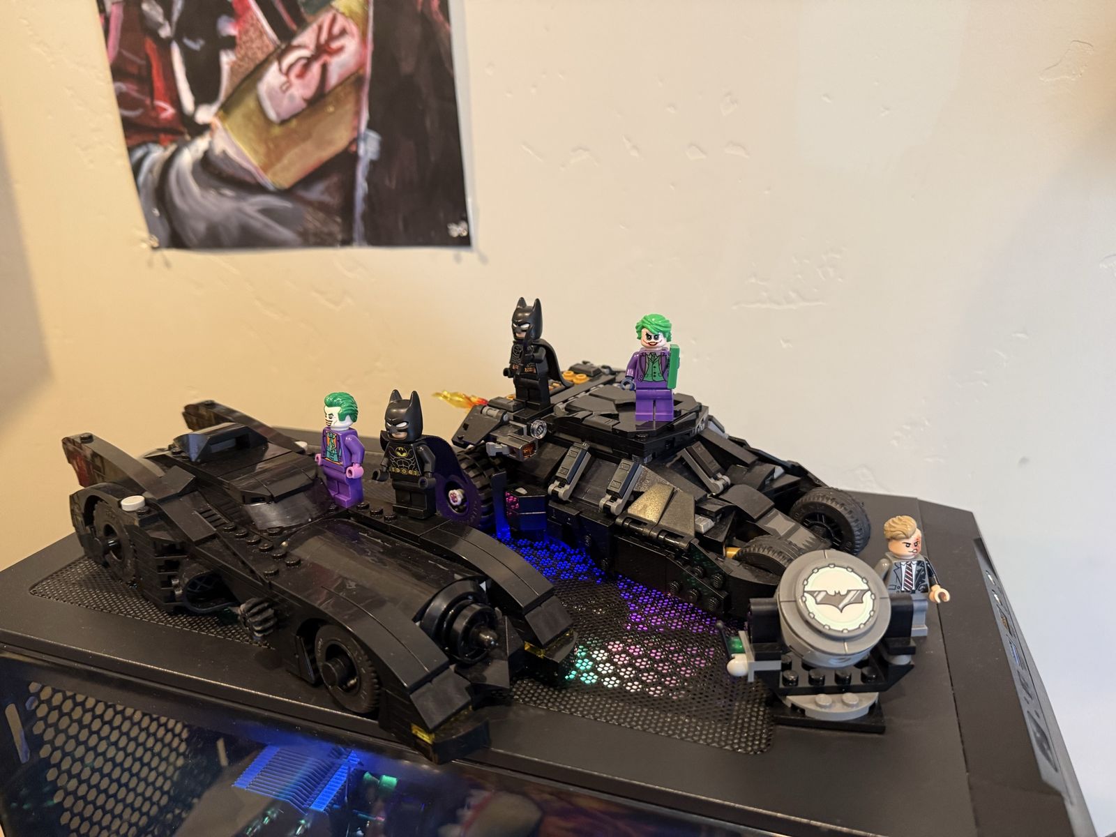 2 Lego batmobiles and figures.