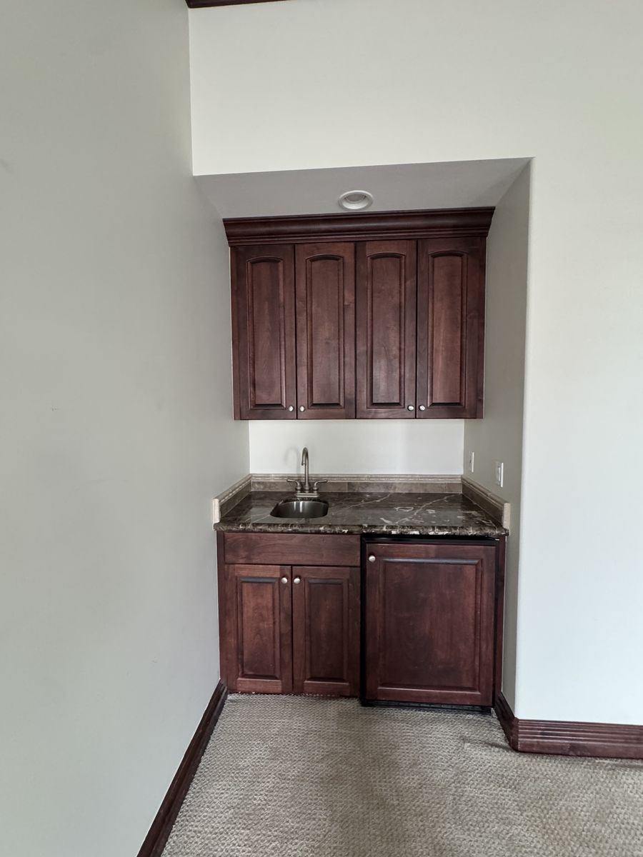 Cabinetry mini fridge and sink