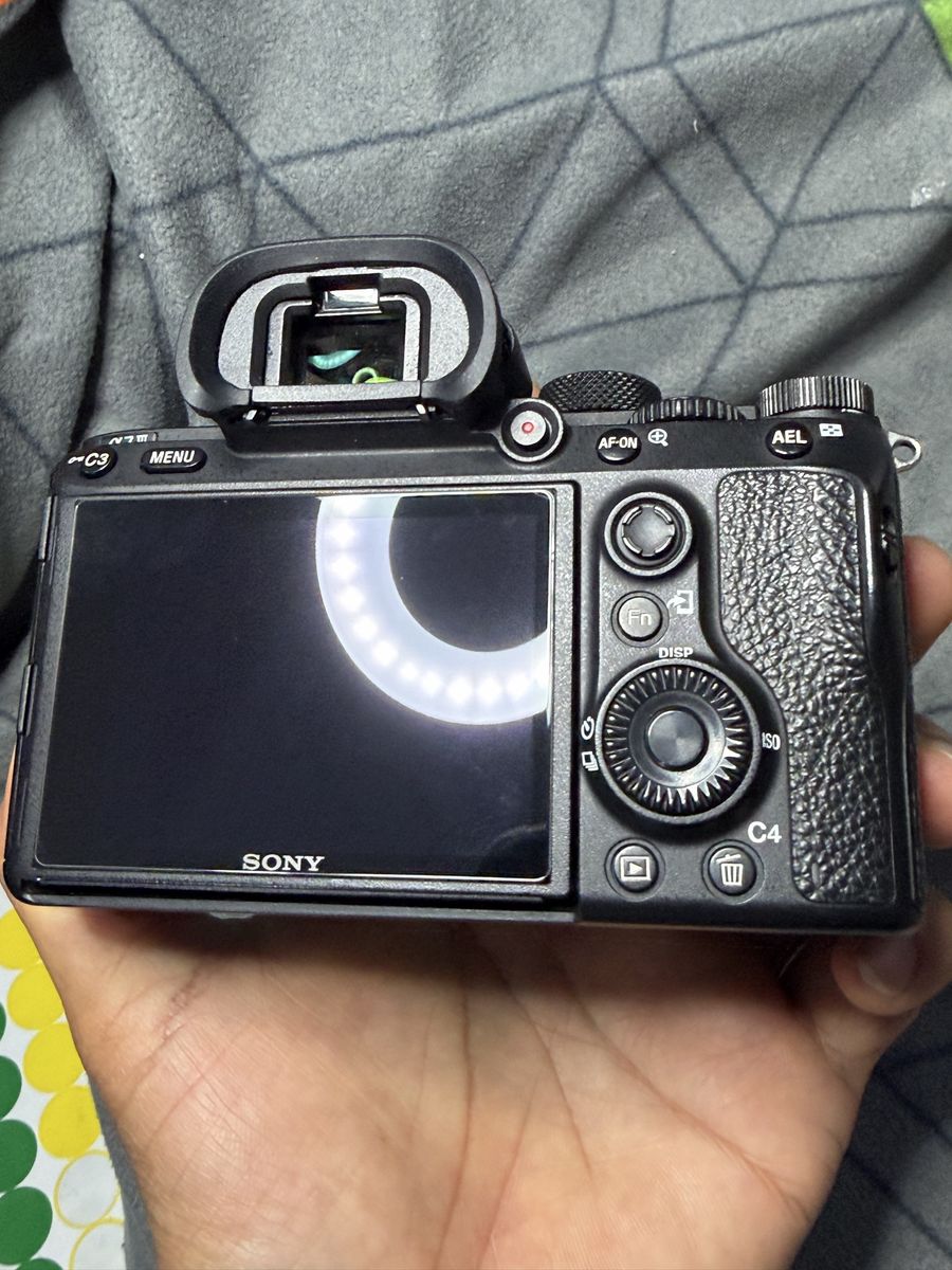 A7iii 1050$, 20k shots, lens 500$