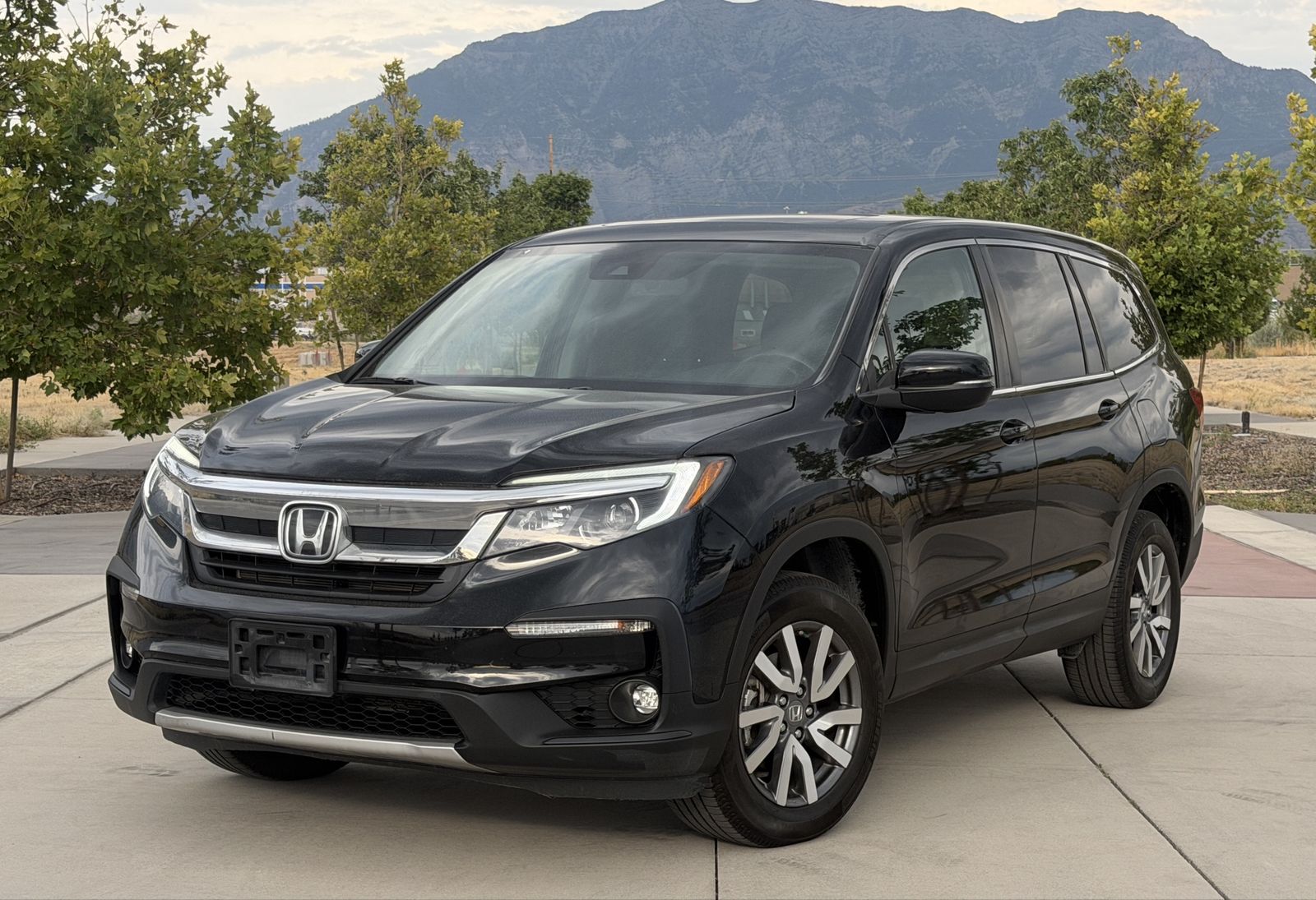 2021 Honda Pilot EX-L — rebuilt & branded title, 20% below market