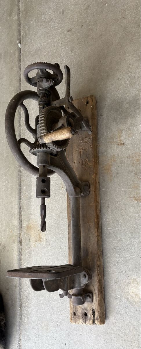 Antique wall mounted drill press