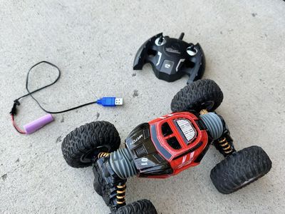 Red RC Stunt Car Remote Control Vehicle Rechargeable Battery & Charger Included