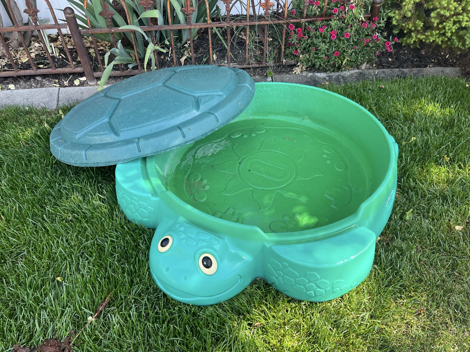 Little tikes turtle sandbox with lid about 3 feet wide