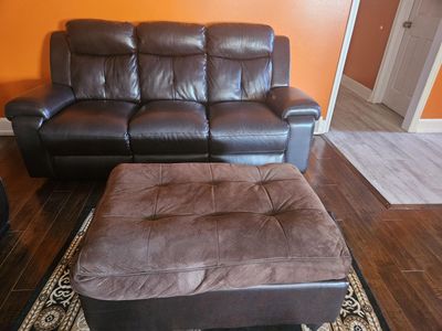 Dark brown faux leather Recliner and Ottoman $250/obo