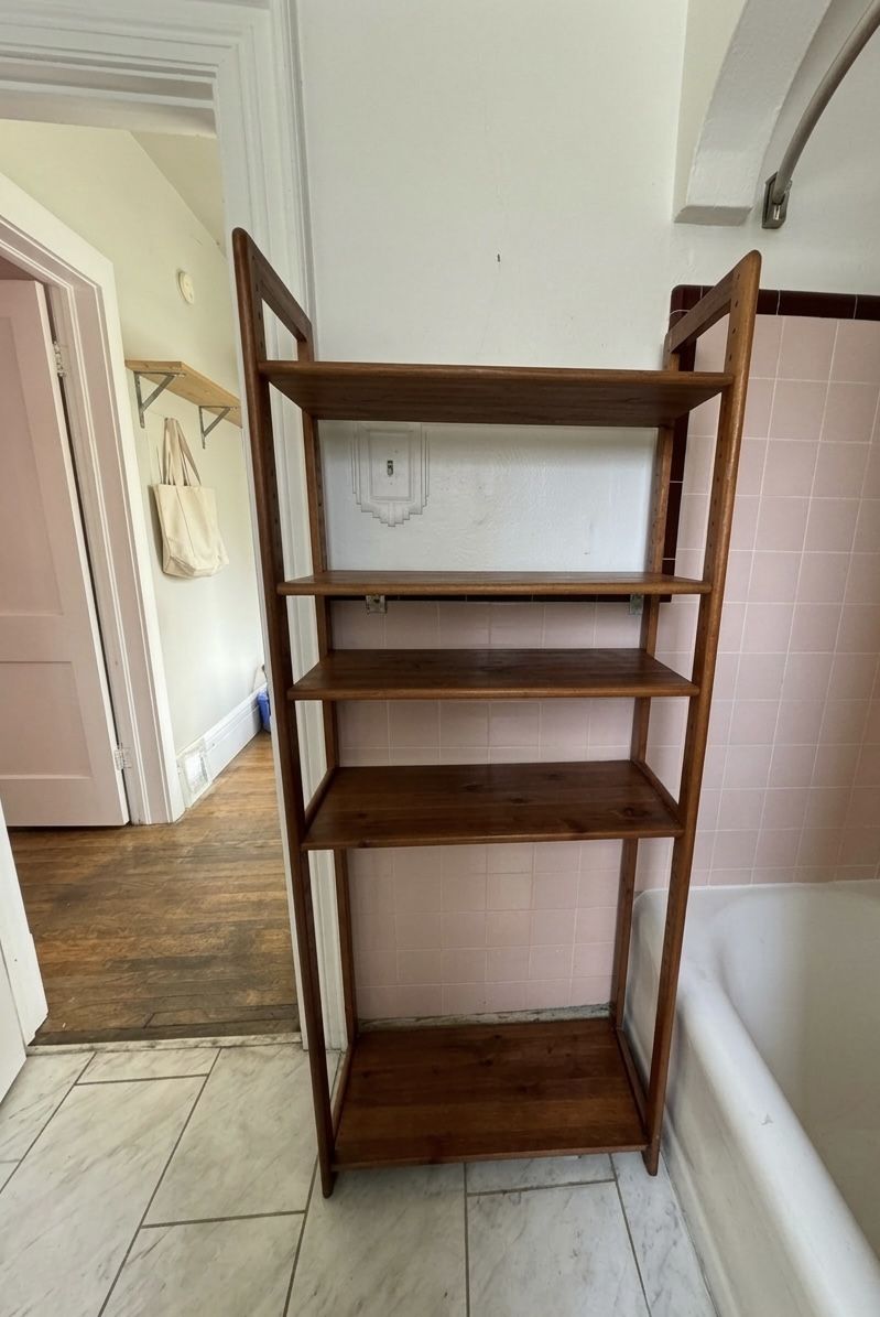 Tall brown wall shelf