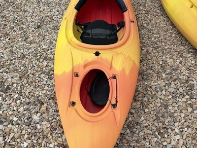 Pair of orange lifetime kayaks