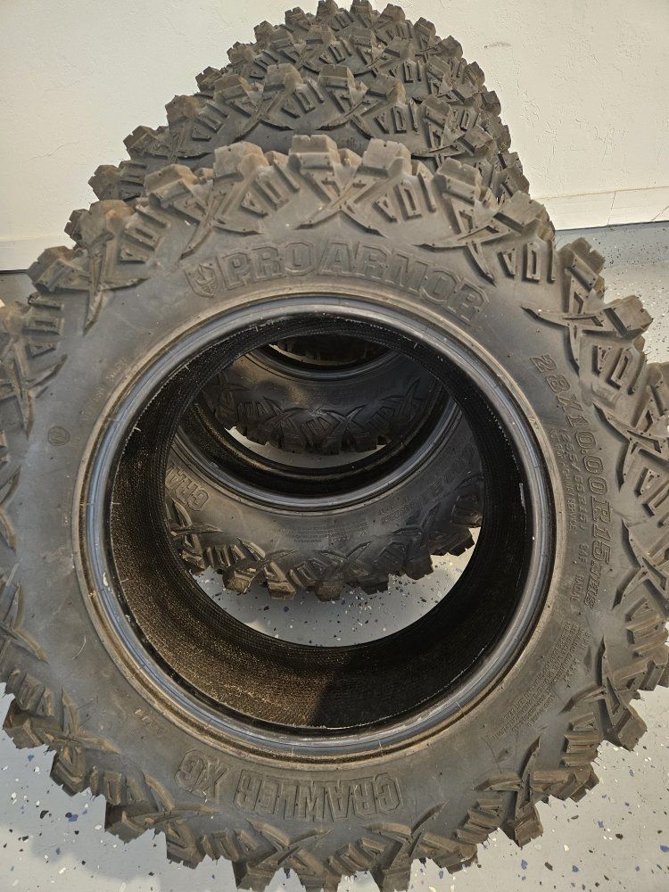Set of 4 Pro Armor Crawler XG Tires 28x10.00R15NHS UTV / ATV