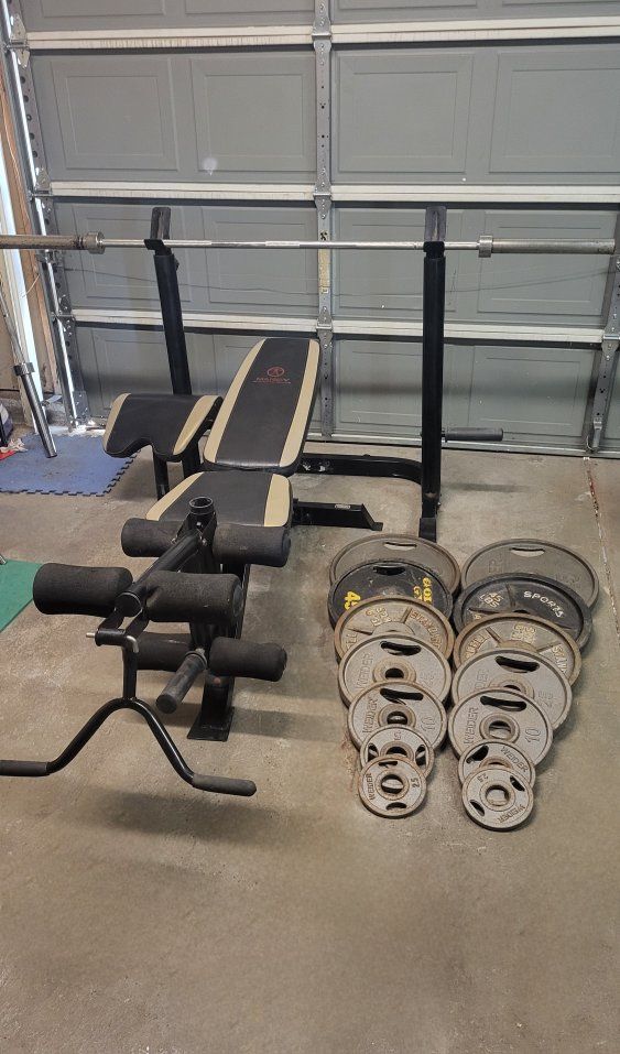 Bench and 335 pounds of weights