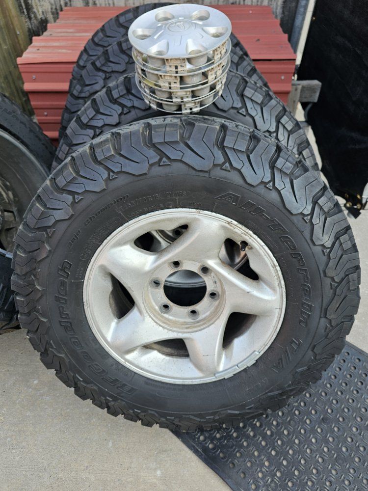 BFGoodrich All-Terrain T/A KO2 Tires LT265/70R16 with 16" Wheels & Toyota Center Caps