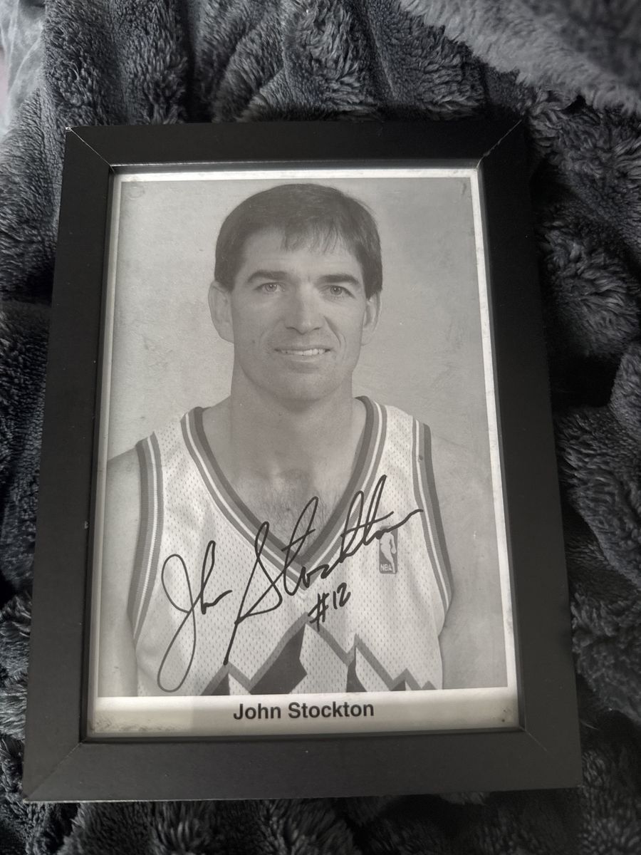 Authentic signed John Stockton framed picture