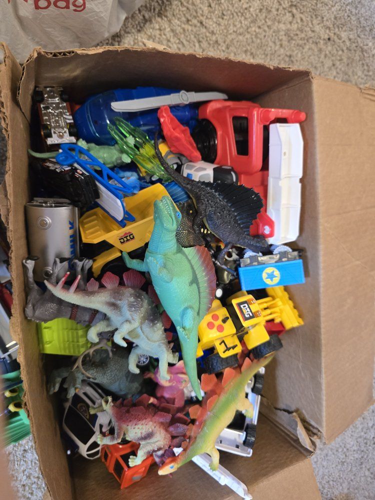 Assorted Toy Lot: Vehicles, Trucks, and Dinosaur Action Figures
