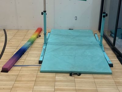 Gymnastics bar and beam