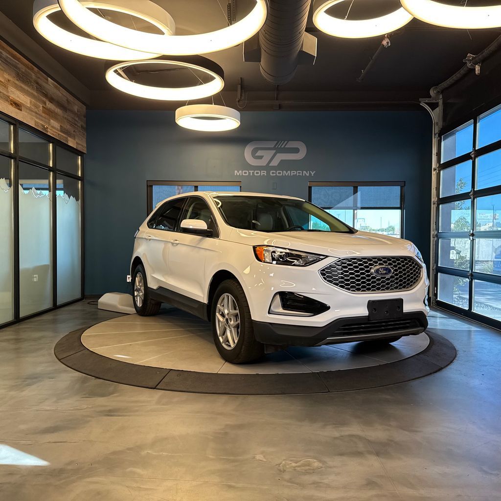 2024 Ford Edge SEL — rebuilt & branded title, 21% below market