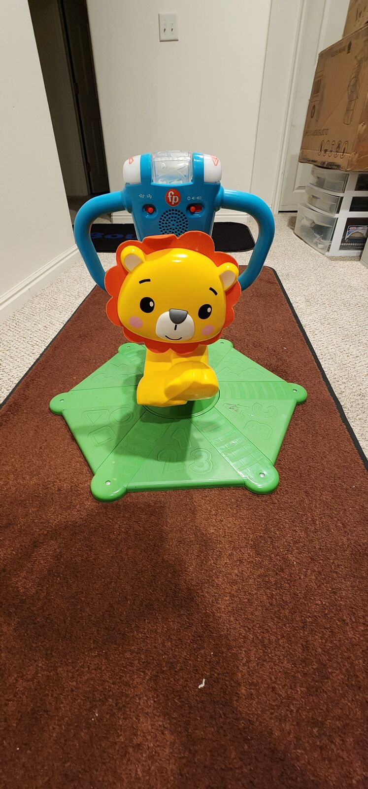 Fisher-Price Bounce and Spin Lion stationary ride-on toy