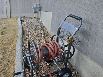 Heavy-Duty Rolling Garden Hose Reel Cart with Pneumatic Tires