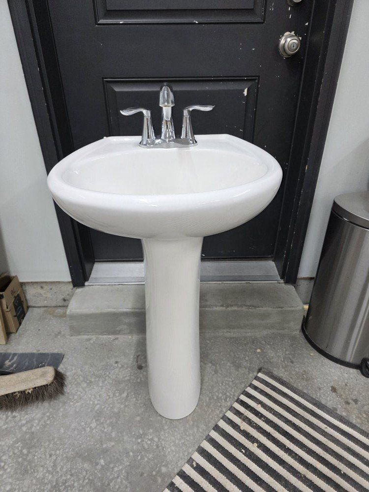 Pedestal Sink, with Moen faucet good condition.