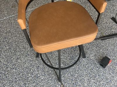 Modern Tan Faux Leather Swivel Bar Stool with Black Metal Frame