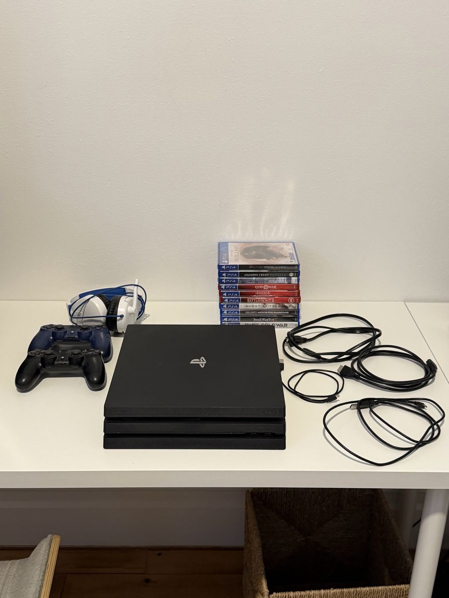 Sony PlayStation 4 Pro Console Bundle with Controllers, Headset, and 10 Games