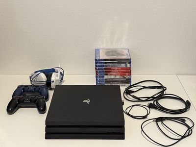 Sony PlayStation 4 Pro Console Bundle with Controllers, Headset, and 10 Games