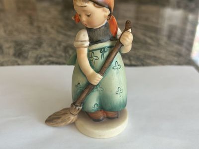 Goebel Hummel figurine commonly known as “Girl Sweeping” / “Little Housekeeper”, model 777.