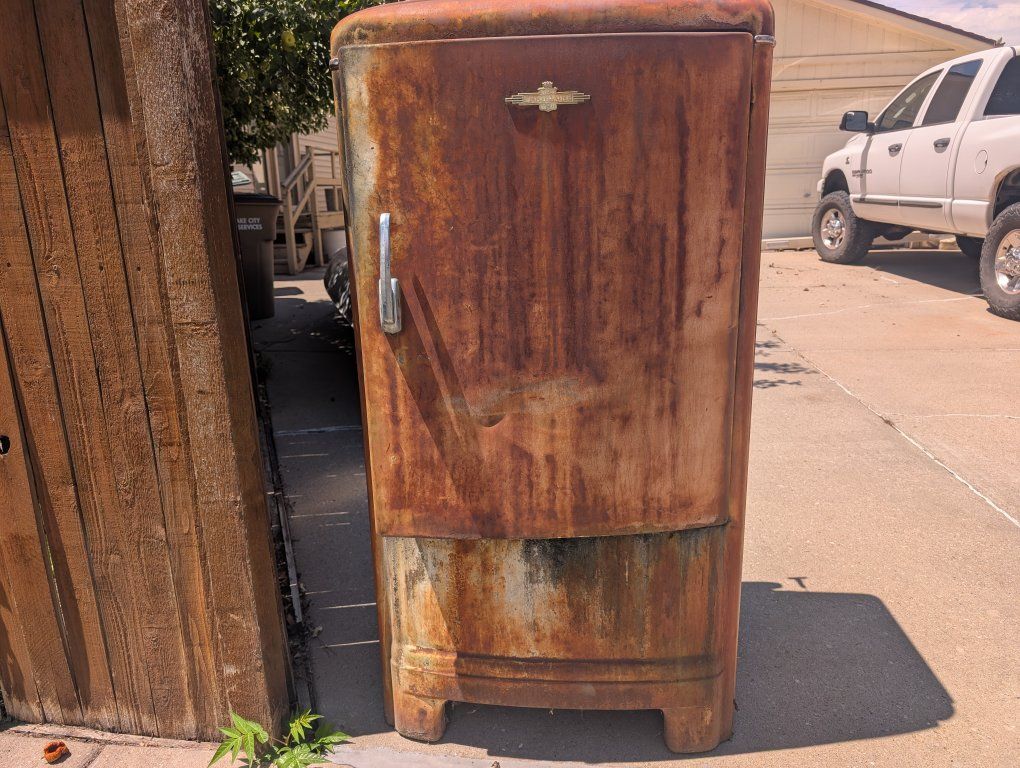 FREE Metal fridge used as smoker or sracp