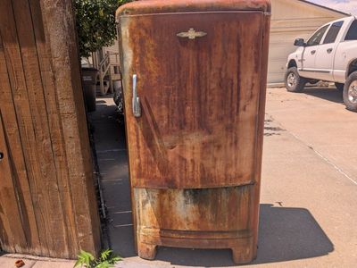FREE Metal fridge used as smoker or sracp