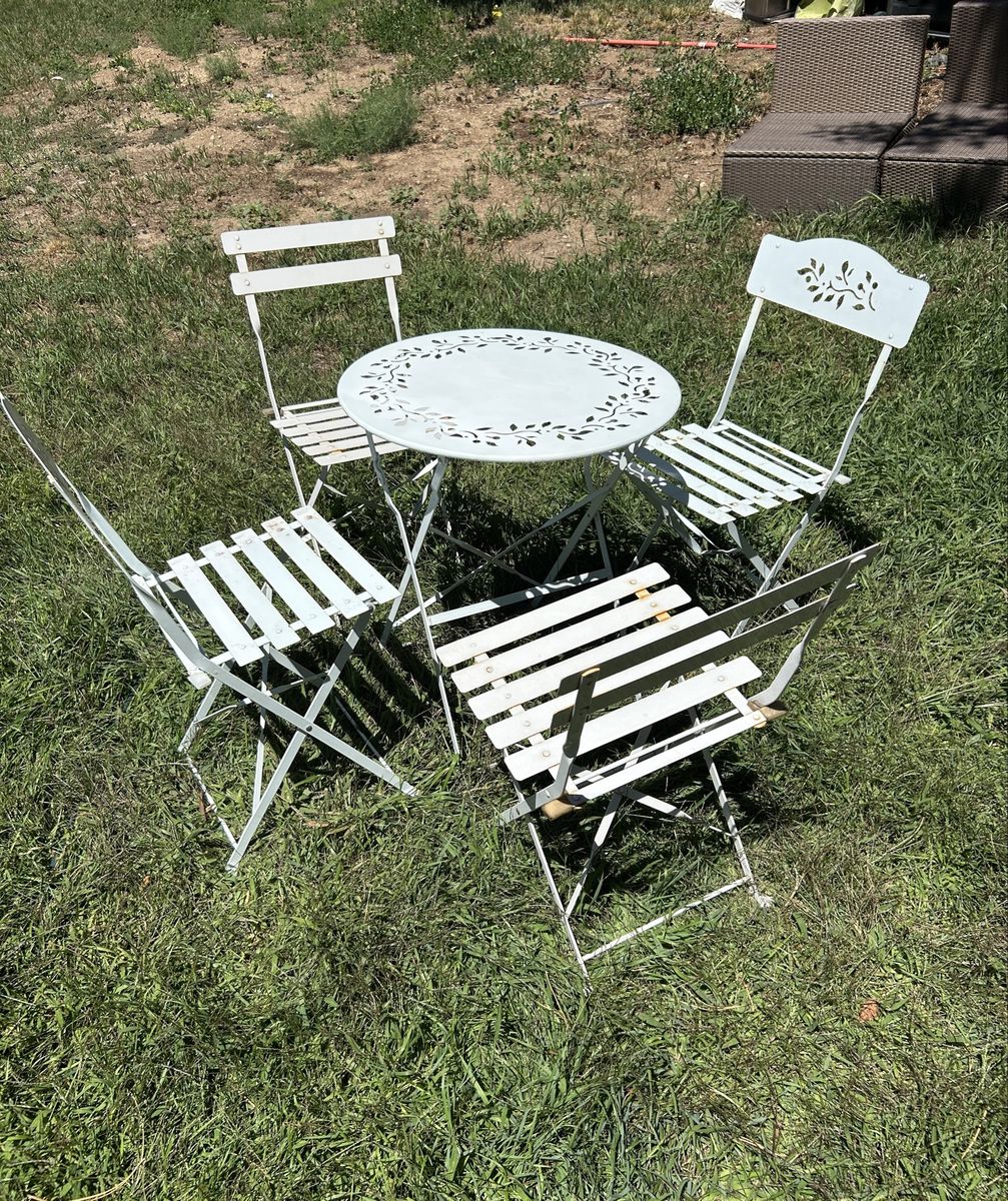 White Metal Bistro Table and 4 Folding Chairs 