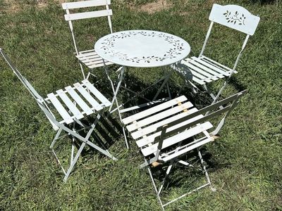 White Metal Bistro Table and 4 Folding Chairs