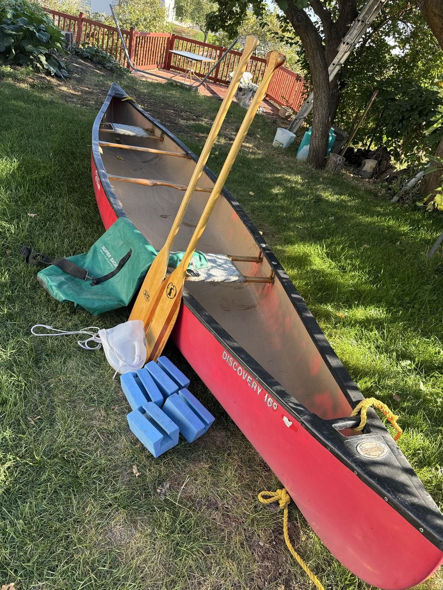 Old Town Discovery 169 Red Canoe with Paddles and Accessories