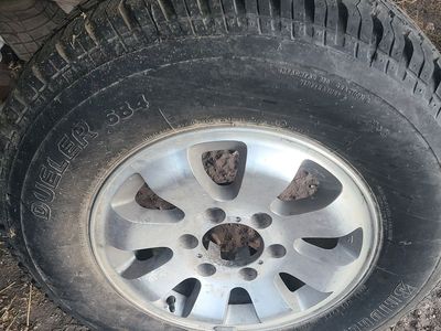 Bridgetone P245/70R16 New with 6 lug rim